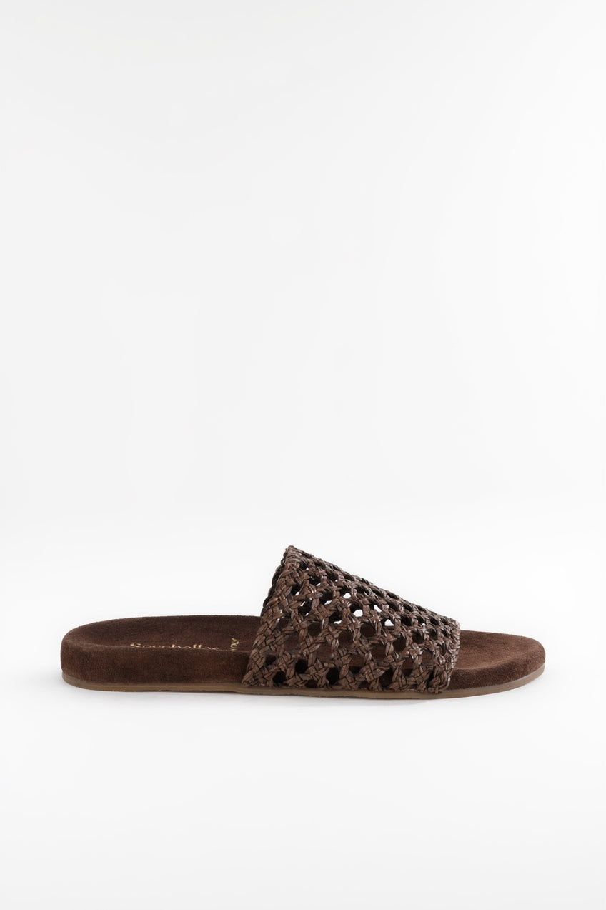 Brown sandal with woven design on a white background
