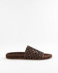 Brown sandal with woven design on a white background