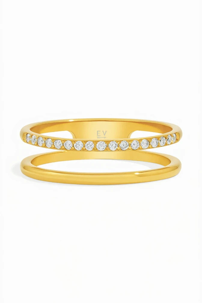 Two gold rings with diamond accents on a white background