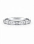 Silver ring with small diamonds on a white background