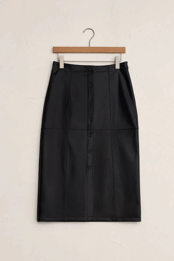 Black skirt on a wooden hanger against a white background
