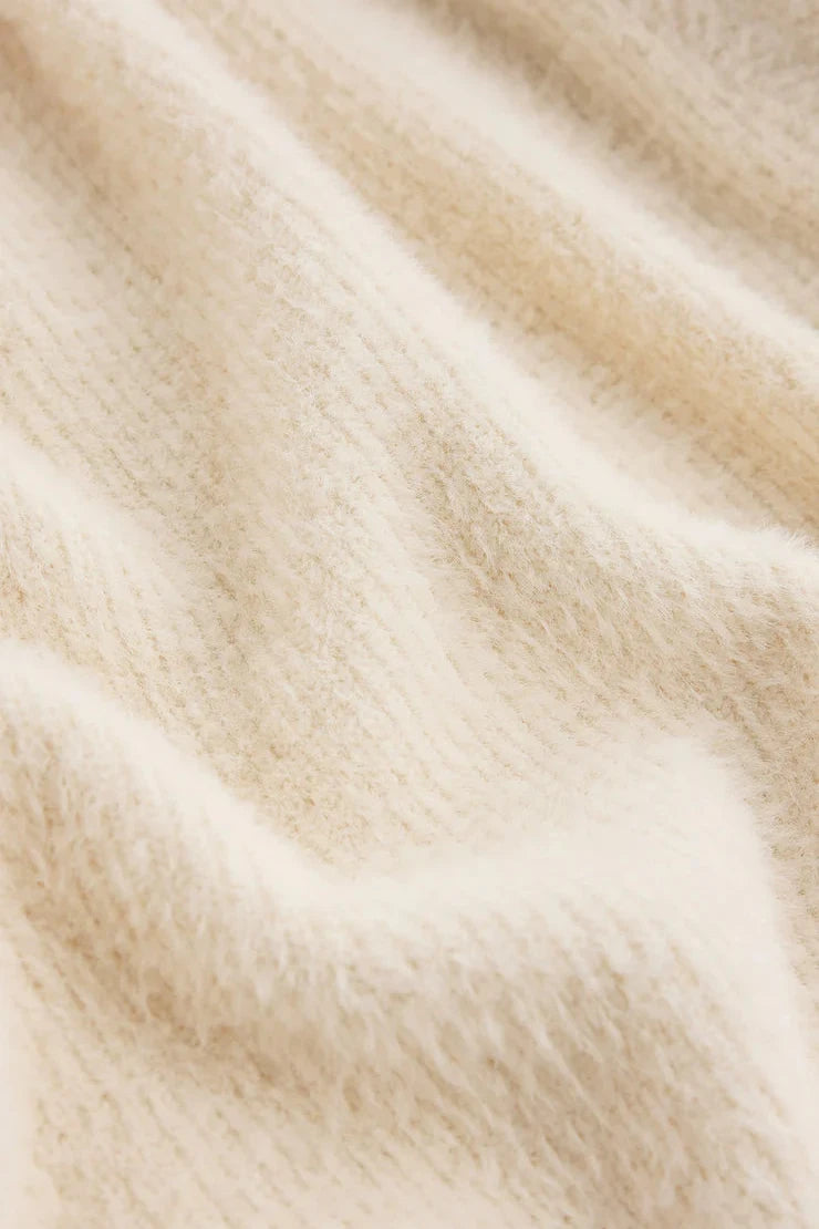 Close-up of beige fabric texture