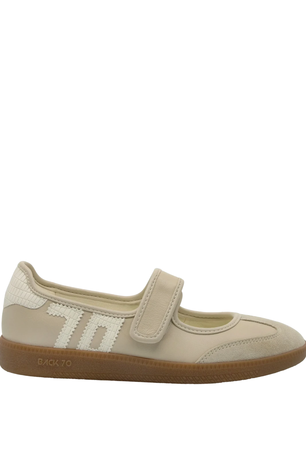 A single children's low-top shoe in light beige suede and mesh with a hook-and-loop strap, a textured heel panel, and a brown gum sole. The brand name 'BACK TO' is visible on the side of the sole.