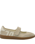 A single children's low-top shoe in light beige suede and mesh with a hook-and-loop strap, a textured heel panel, and a brown gum sole. The brand name 'BACK TO' is visible on the side of the sole.