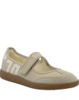 Beige shoe with a brown sole on a white background