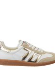 White and gold sneaker with brown sole on a white background
