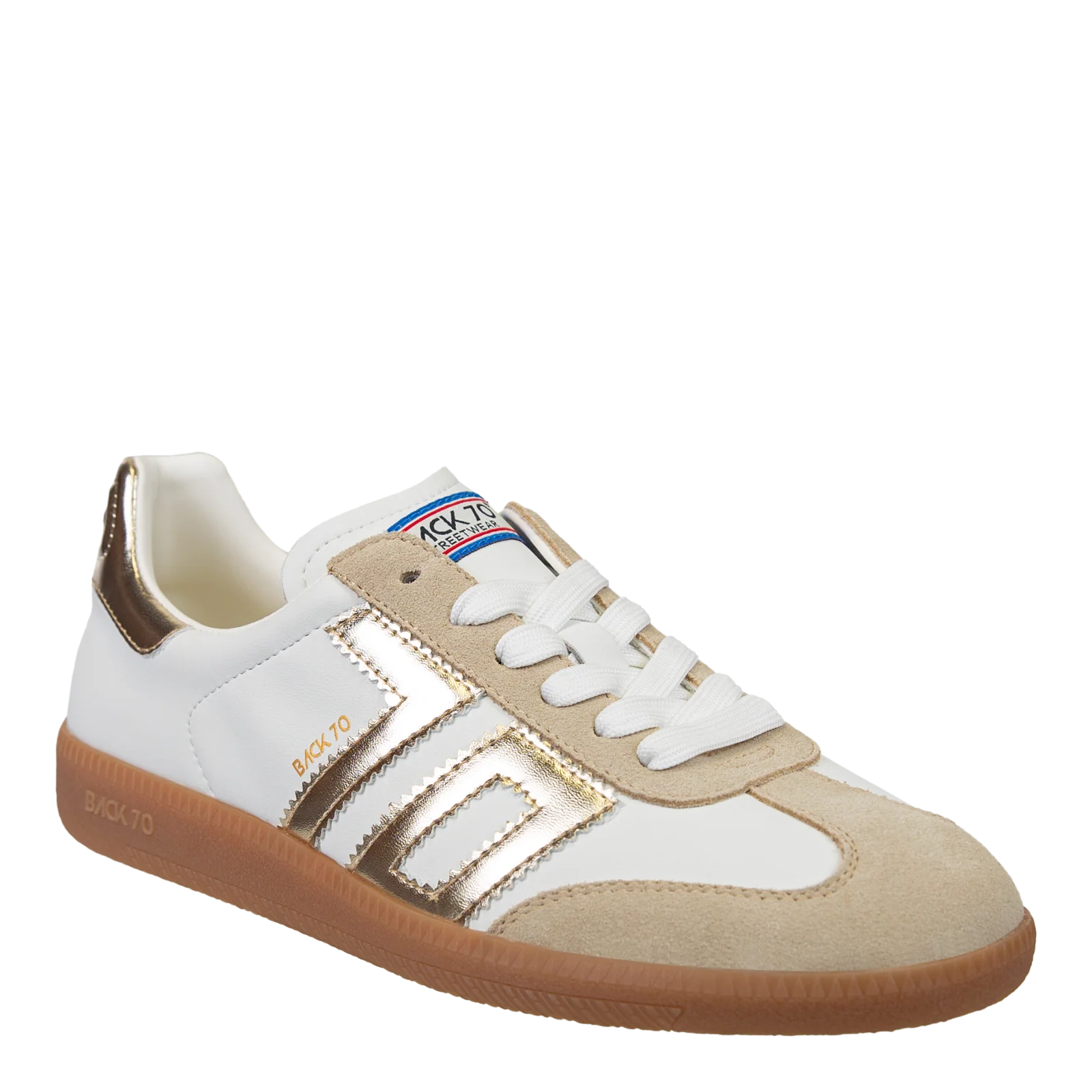 White and beige sneaker with a visible brand logo on a white background