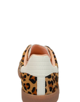 Sneaker with leopard print pattern on a white background