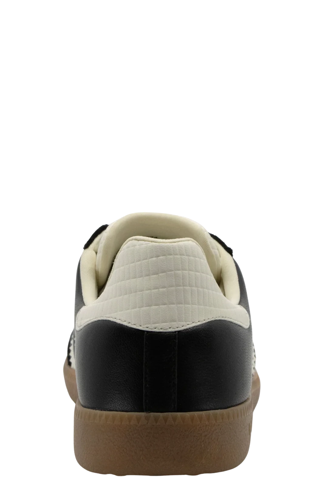 Black and white sneaker with a brown sole on a white background