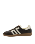 Black and white sneaker with a brown sole on a white background