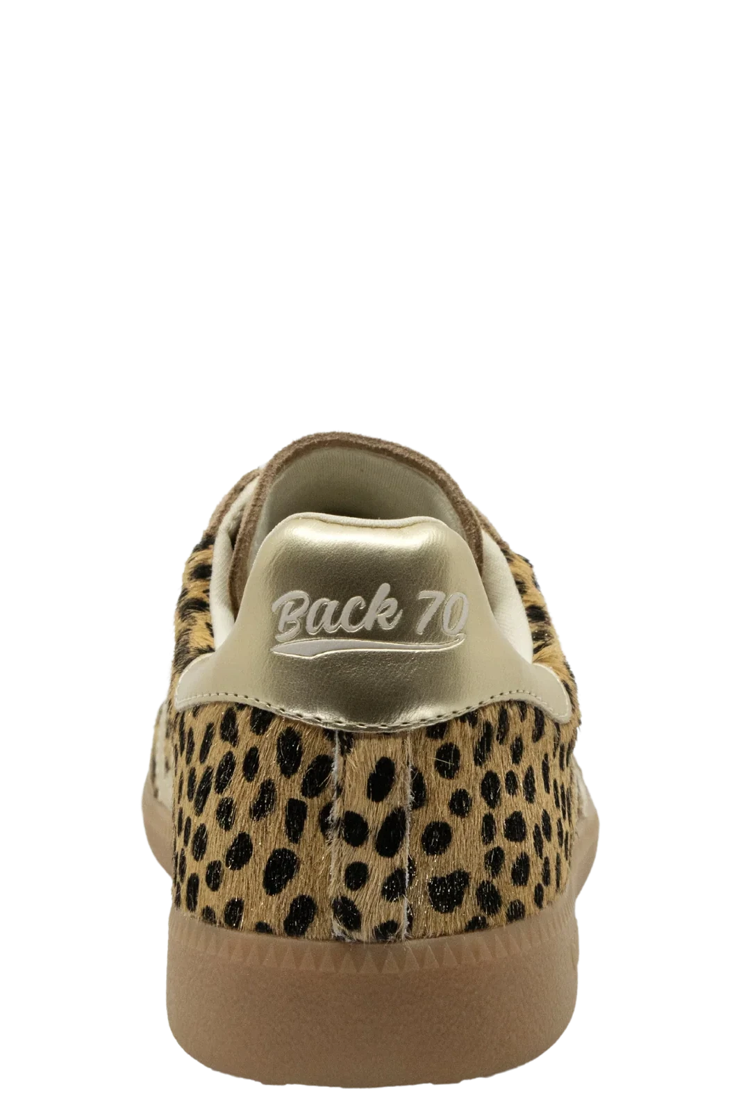 A single low-top sneaker shown from the back, featuring a leopard print upper with a metallic gold heel counter and a tan sole.