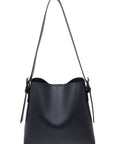 Black handbag with a shoulder strap on a white background