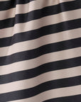 Close-up of black and beige striped fabric