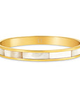 Gold bracelet with white stone inlay on a white background
