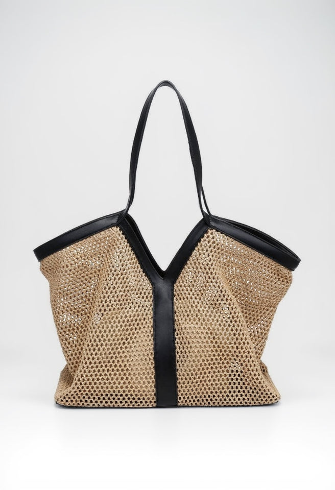 Beige mesh handbag with black trim on a white background