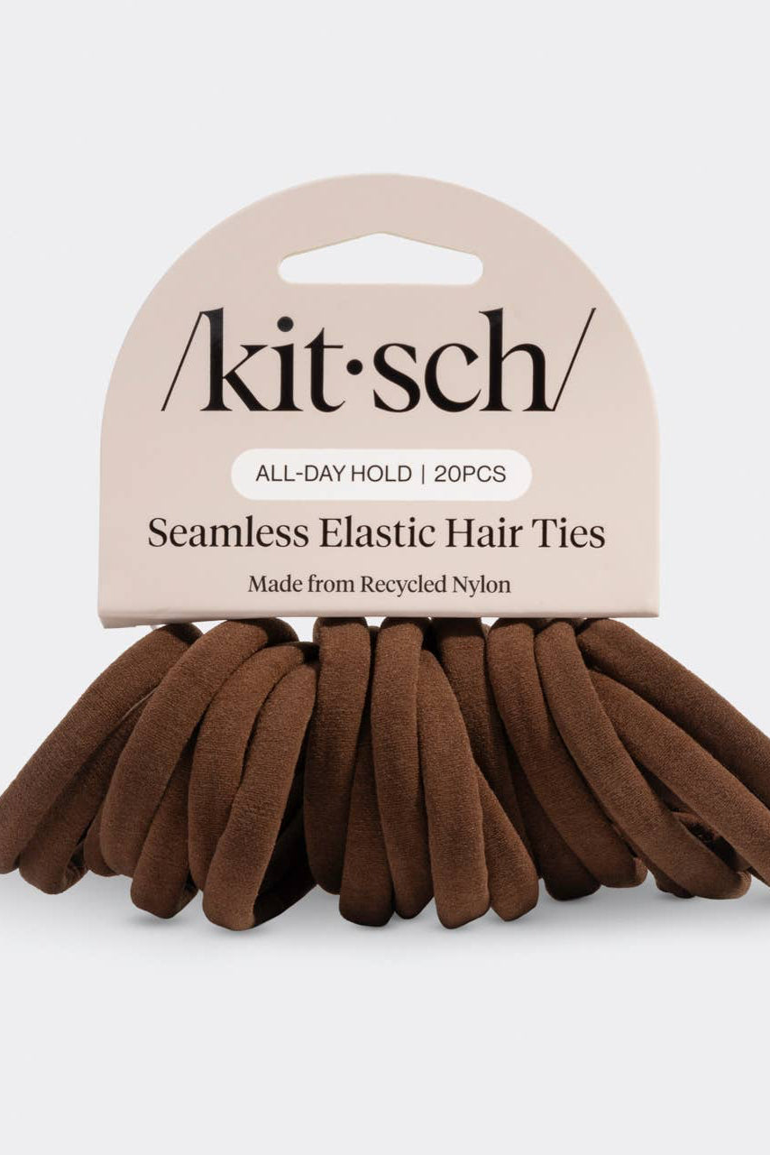 Kit-sch brown hair ties with packaging on a light gray background