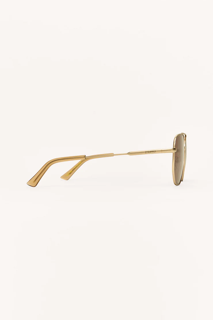 Gold sunglasses on a white background