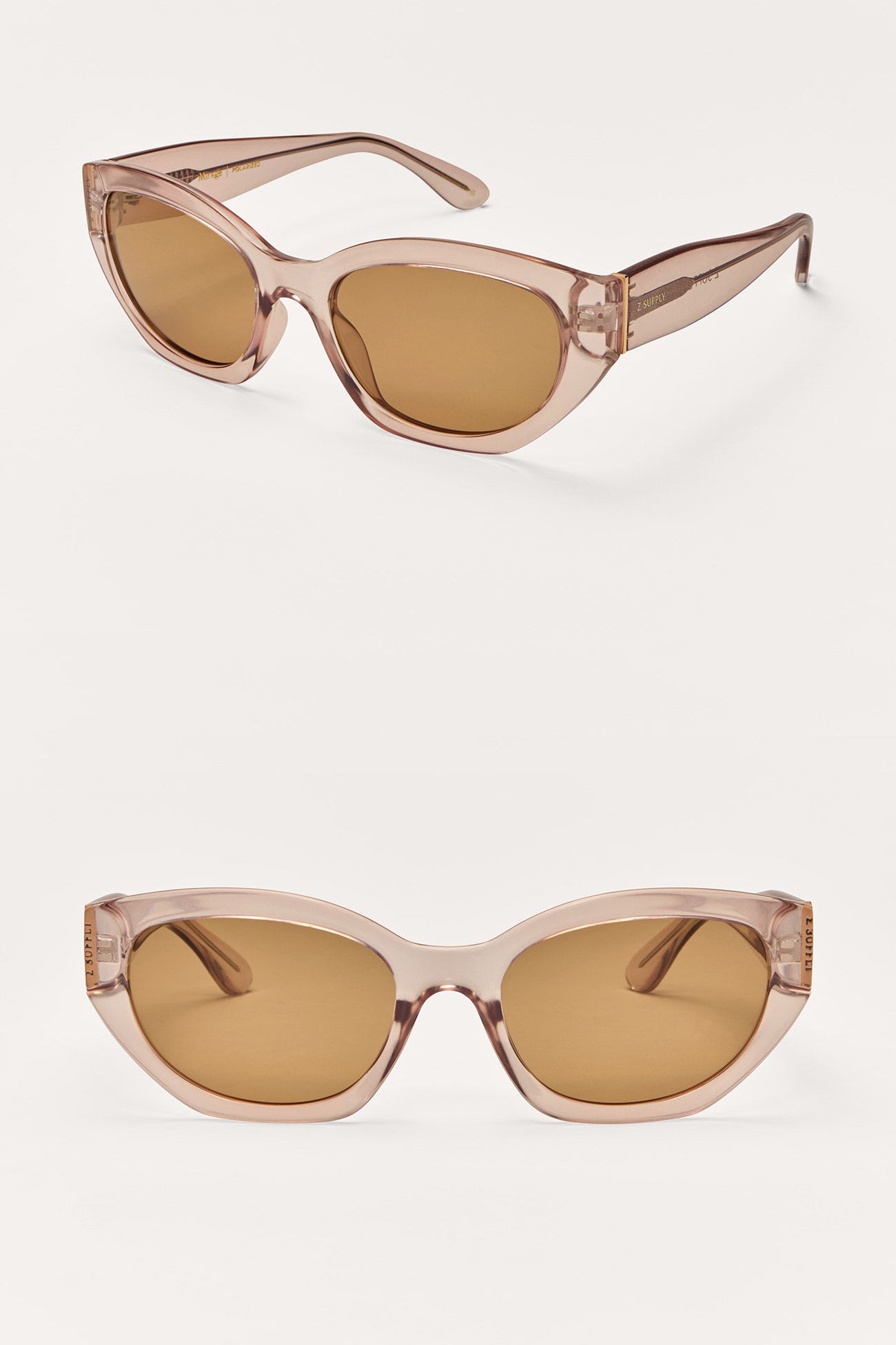 Pair of cat-eye sunglasses with brown lenses on a white background