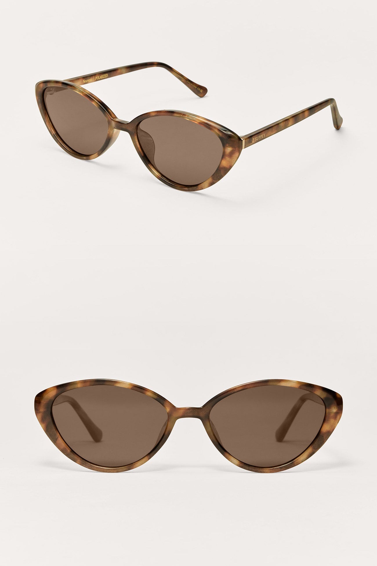 Pair of tortoiseshell cat-eye sunglasses on a white background