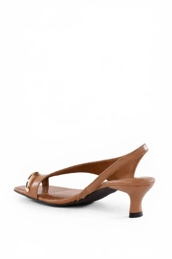 Brown sandal with a thin strap on a white background